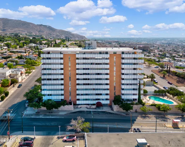 a view of a city with tall buildings