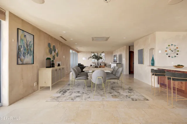 a kitchen with stainless steel appliances granite countertop a refrigerator sink and cabinets