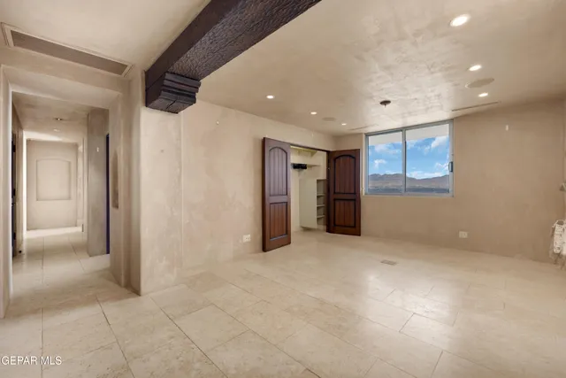 a bedroom with furniture and wooden floor