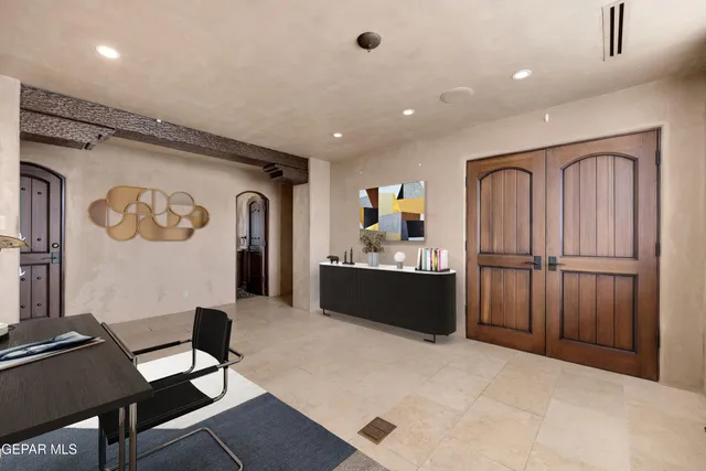 a bathroom with a shower sink and mirror