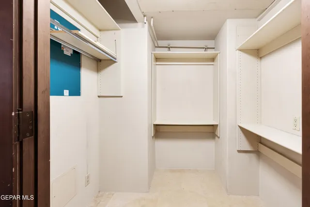 a bathroom with a granite countertop sink and mirror