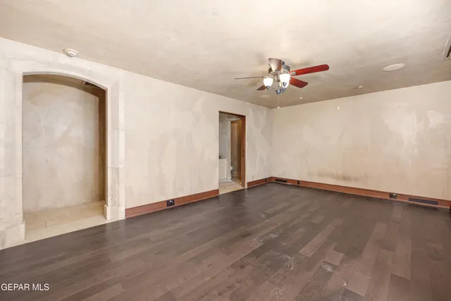 a kitchen with kitchen island a sink stove and refrigerator
