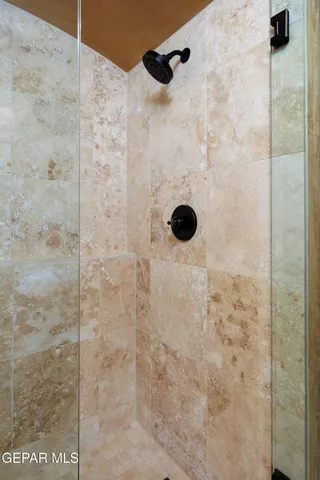 a swimming pool with outdoor seating and house