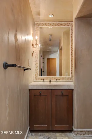 a view of a swimming pool with a lounge chairs