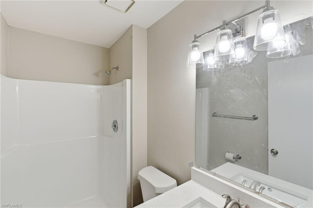 5283 17th Place Southwest Naples, FL 34116 - Photo 17 of 20 a bathroom with a shower and toilet