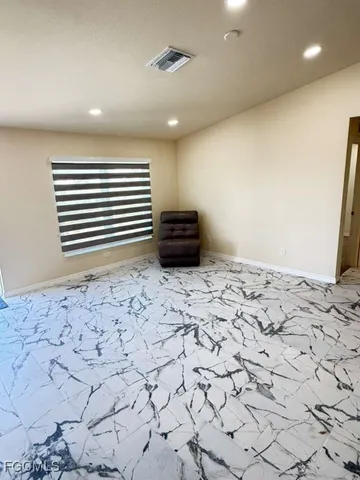 a view of wooden floor in kitchen