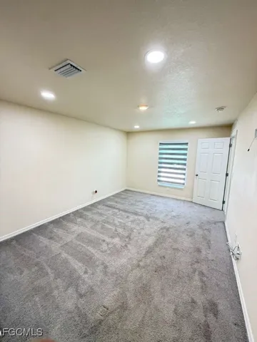 a view of a room with racks on the wall