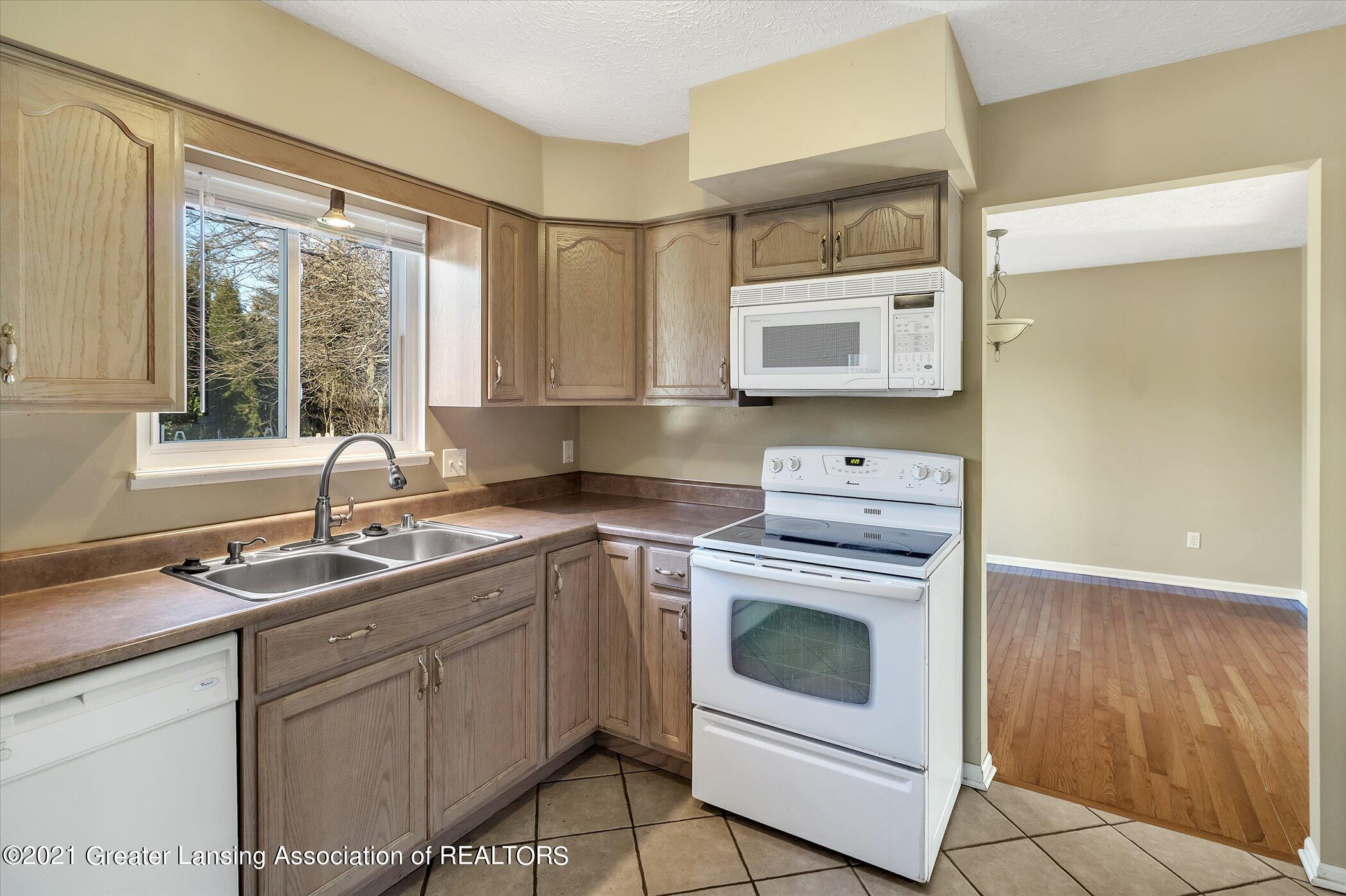 5555 Marsh Road Haslett, MI 48840 - Photo 11 of 34 17-5555-Marsh-Rd-WindowStill-Real-Estate
