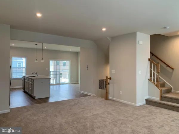a view of livingroom with furniture and stairs