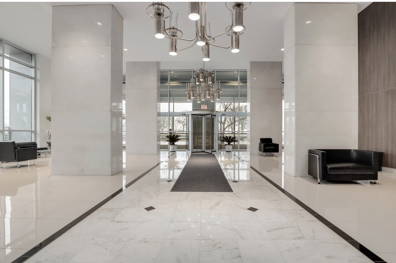 1550 North Lake Shore Drive, Unit 9F Chicago, IL 60610 - Photo 12 of 19 a living room with furniture and a flat screen tv