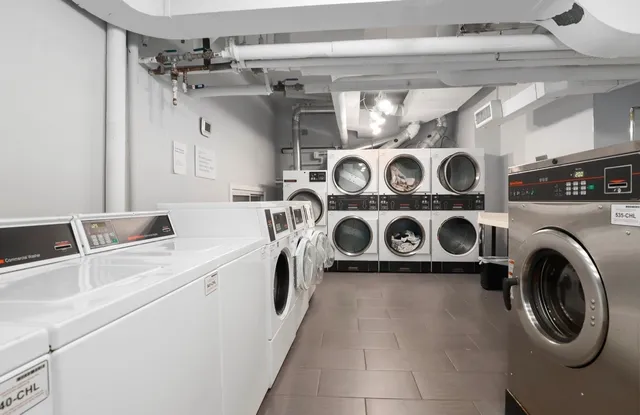 a view of a workspace with bookshelf