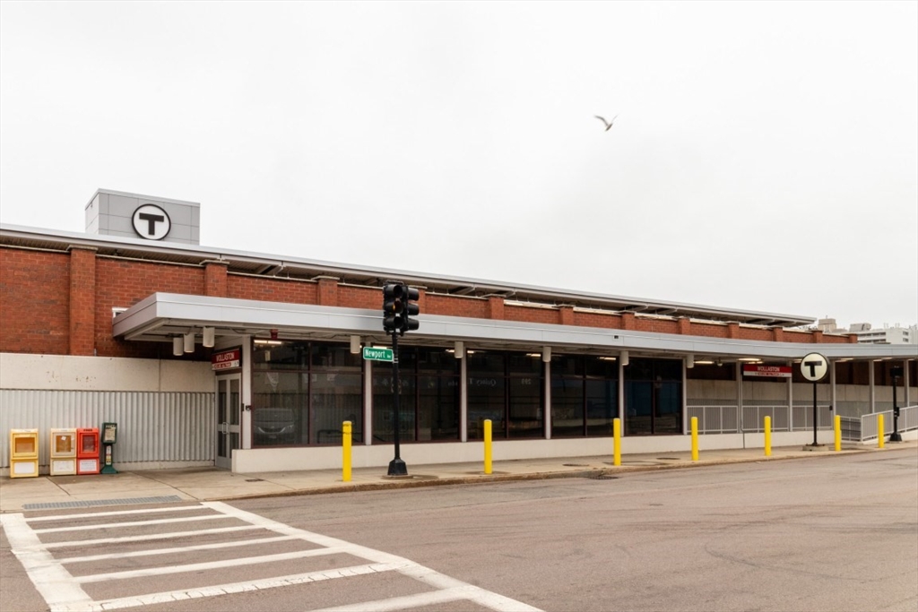 151 Pine Street, Unit 2 Quincy, MA 02170 - Photo 11 of 11 a view of a building with a window and a car parked