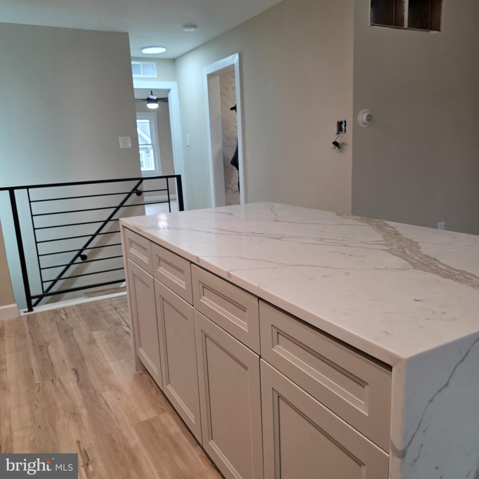 12702 Knights Road Philadelphia, PA 19154 - Photo 5 of 23 a room with a sink and a wooden floor