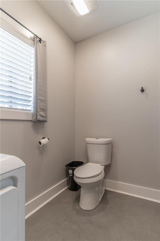 2250 Sperin Road Ball Ground, GA 30107 - Photo 37 of 56 a bathroom with a toilet