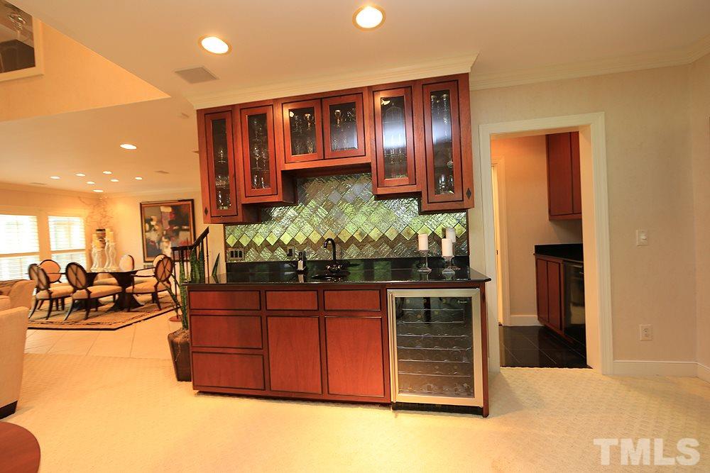 2023 Landings Way Raleigh, NC 27615 - Photo 14 of 25 a kitchen with stainless steel appliances granite countertop a stove and a refrigerator