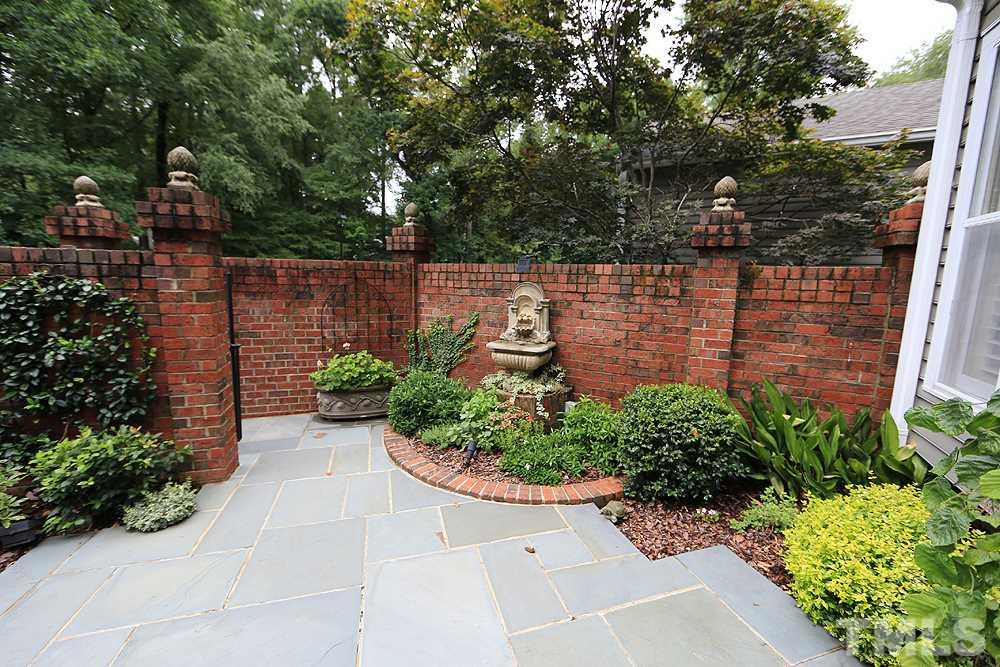 2023 Landings Way Raleigh, NC 27615 - Photo 3 of 25 a view of a garden with plants