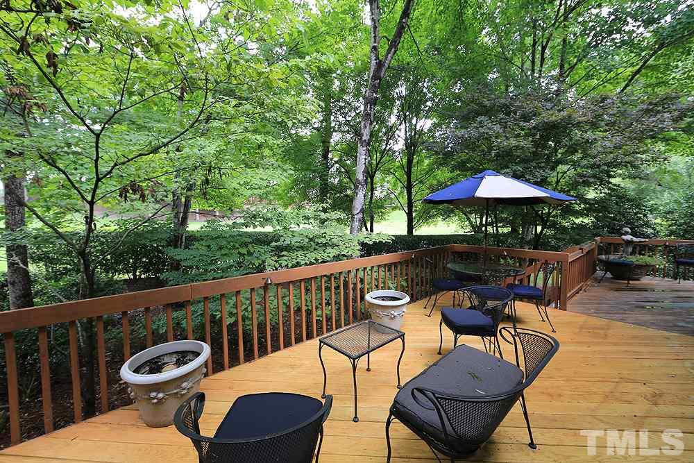 2023 Landings Way Raleigh, NC 27615 - Photo 24 of 25 a view of a balcony with furniture and wooden floor