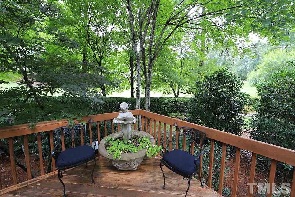 2023 Landings Way Raleigh, NC 27615 - Photo 25 of 25 a view of a chair and table on the balcony
