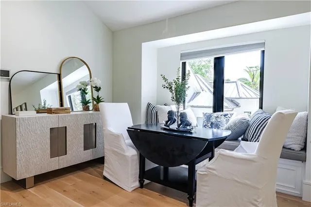 a living room with furniture and window
