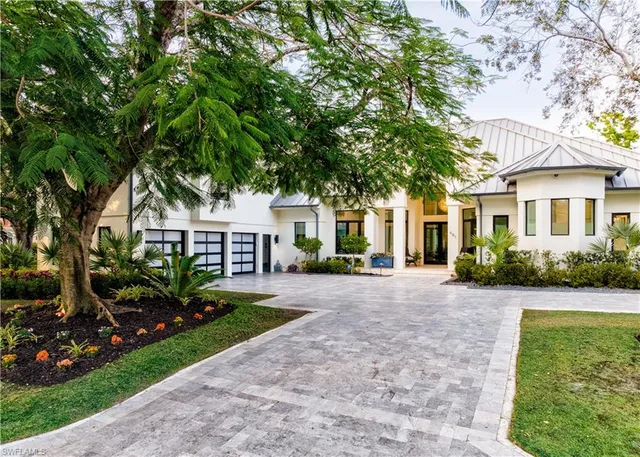 a view of a house with a garden