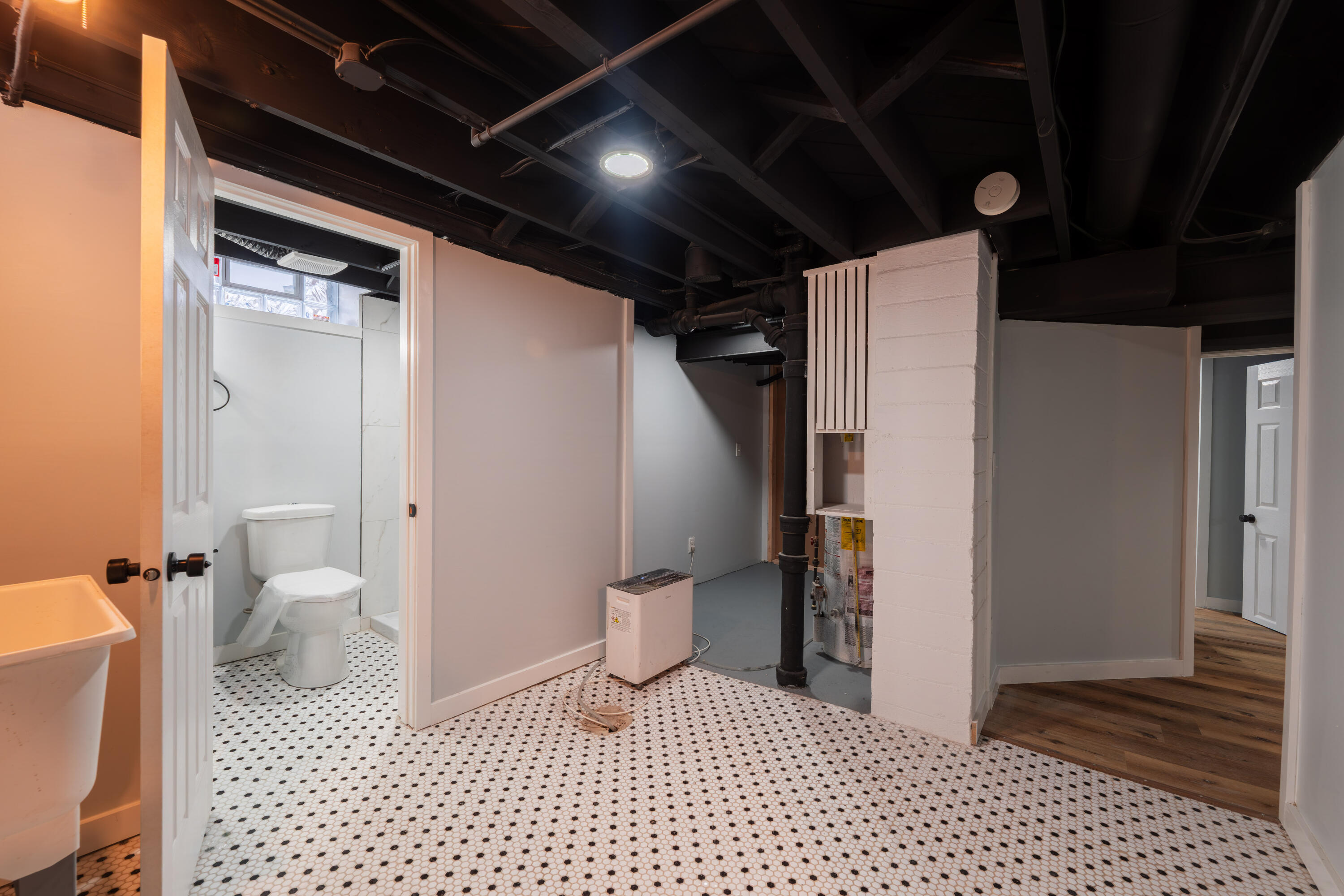 5657 North 40th Street Milwaukee, WI 53209 - Photo 22 of 27 Finished Laundry room & Full bath