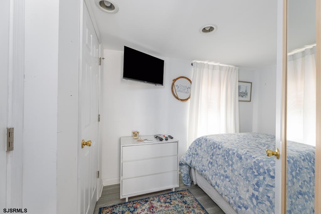 100 Decatur Avenue Somers Point, NJ 08244 - Photo 18 of 52 a bathroom with a sink and a mirror