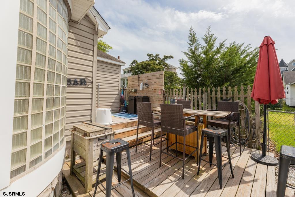 100 Decatur Avenue Somers Point, NJ 08244 - Photo 23 of 52 a view of a backyard with sitting area