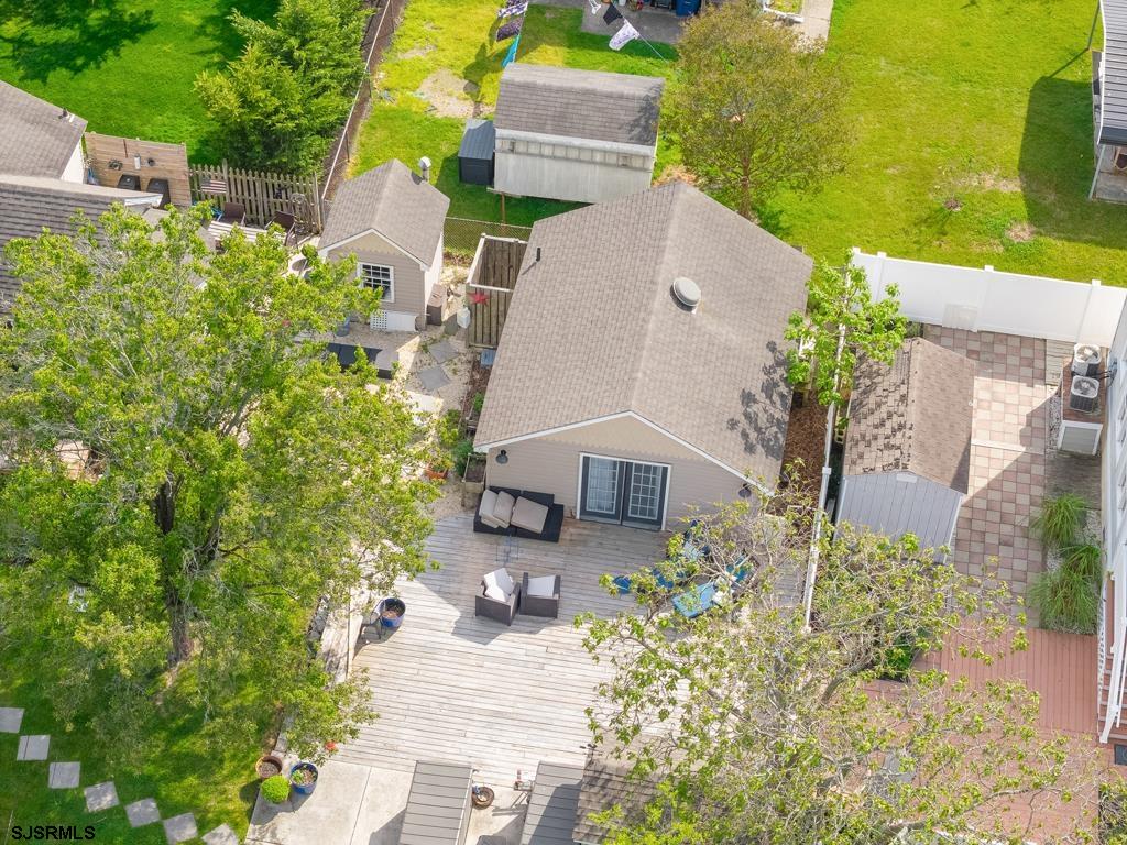 100 Decatur Avenue Somers Point, NJ 08244 - Photo 31 of 52 an aerial view of a house with a yard and trees