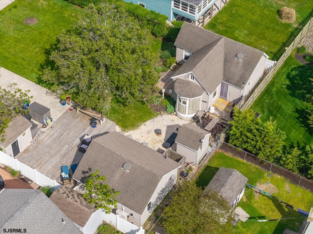 100 Decatur Avenue Somers Point, NJ 08244 - Photo 34 of 52 an aerial view of a house with a yard and garden