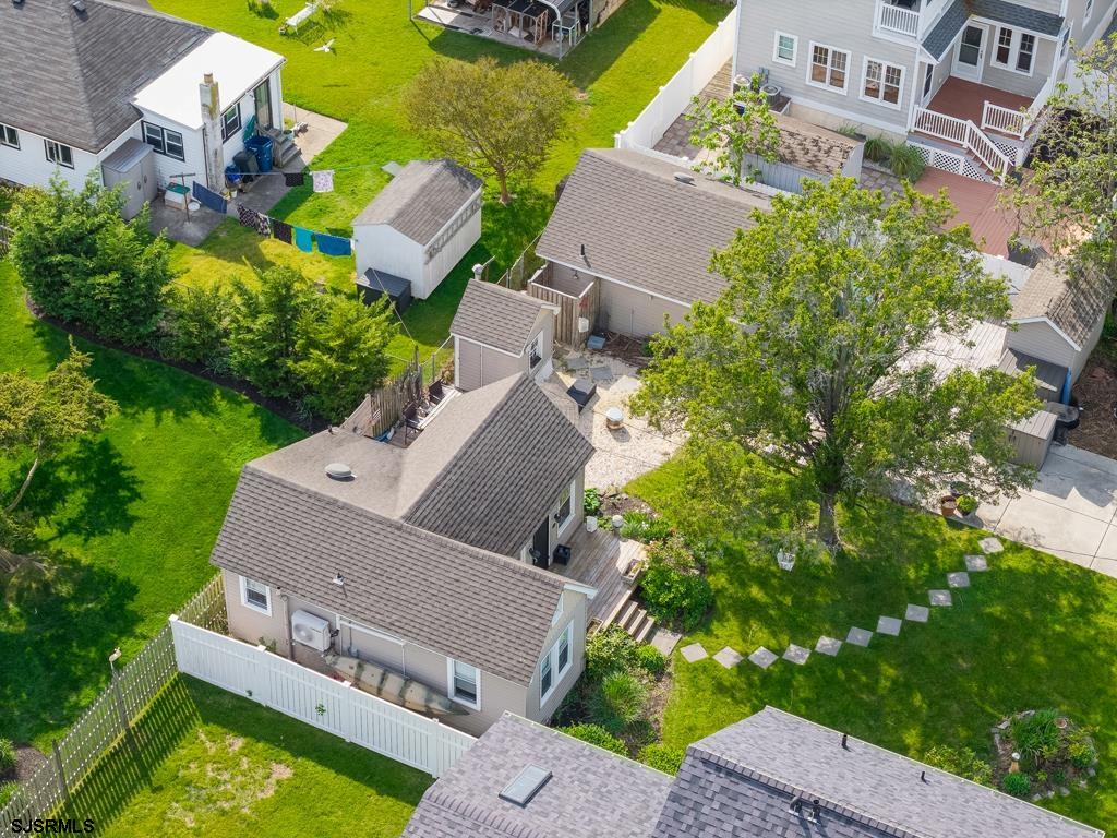100 Decatur Avenue Somers Point, NJ 08244 - Photo 38 of 52 an aerial view of a house with a garden and swimming pool