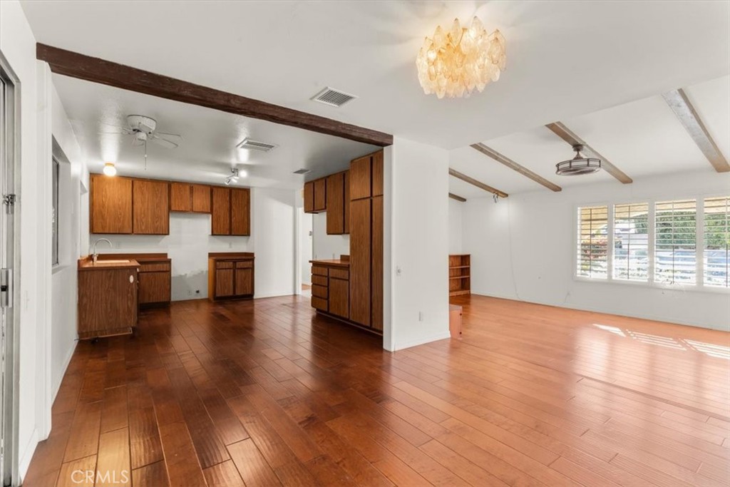 2250 Tamarisk Road Palm Springs, CA 92262 - Photo 18 of 36 a view of a kitchen with a sink and a stove top oven
