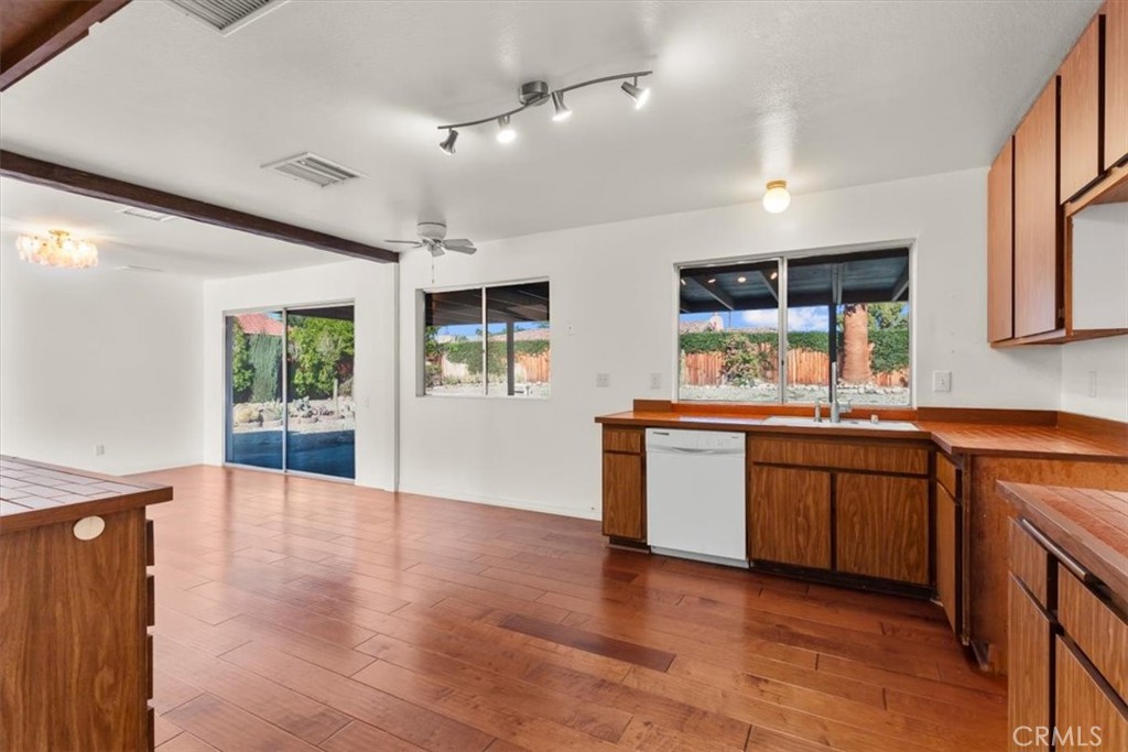 2250 Tamarisk Road Palm Springs, CA 92262 - Photo 19 of 36 a view of a kitchen with a sink and a large window