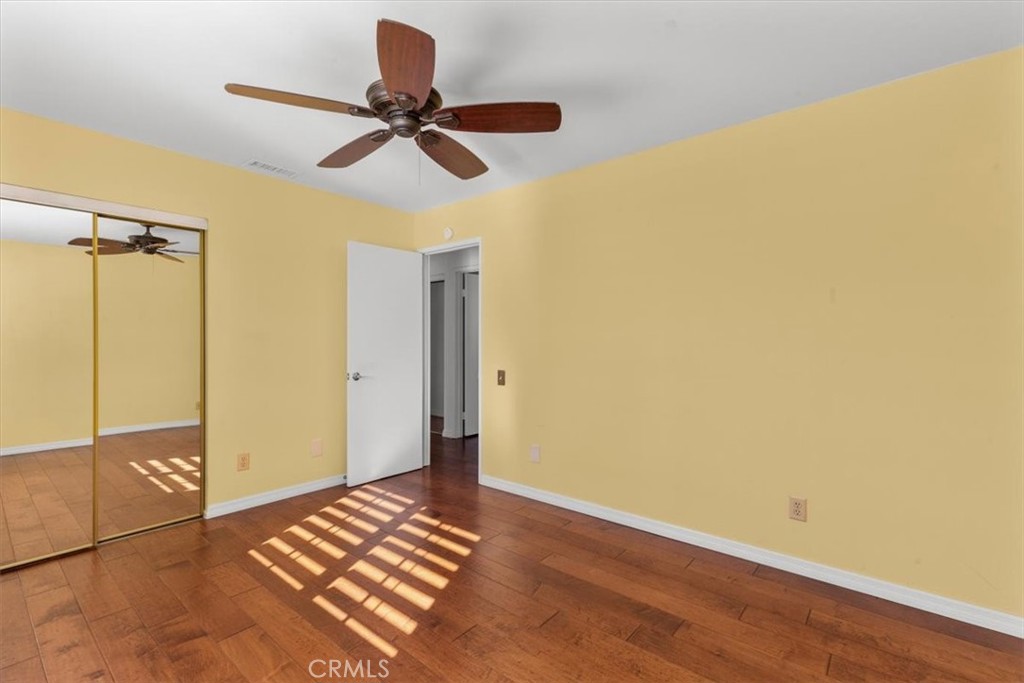 2250 Tamarisk Road Palm Springs, CA 92262 - Photo 26 of 36 a view of empty room with wooden floor