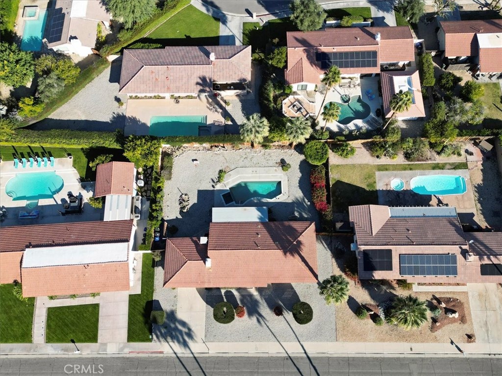2250 Tamarisk Road Palm Springs, CA 92262 - Photo 4 of 36 an aerial view of houses with yard