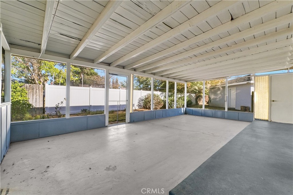 3921 Heidi Road Riverside, CA 92504 - Photo 17 of 20 a view of an empty room with a sliding door