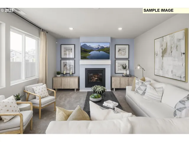 a living room with furniture fireplace and window