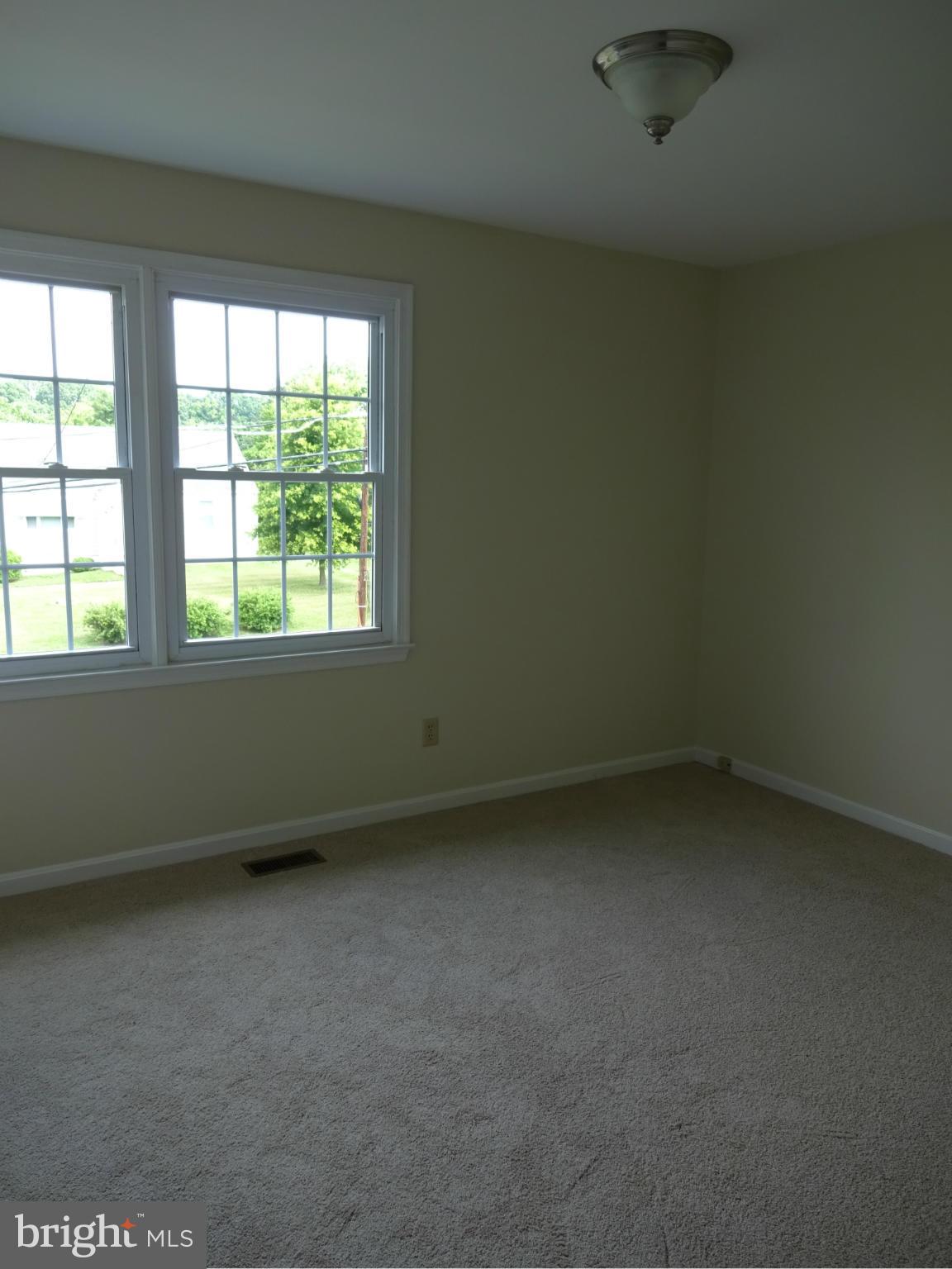 1613 Cape May Road Baltimore, MD 21221 - Photo 18 of 28 Bedroom 2 w/ New Carpeting and Freshly Painted