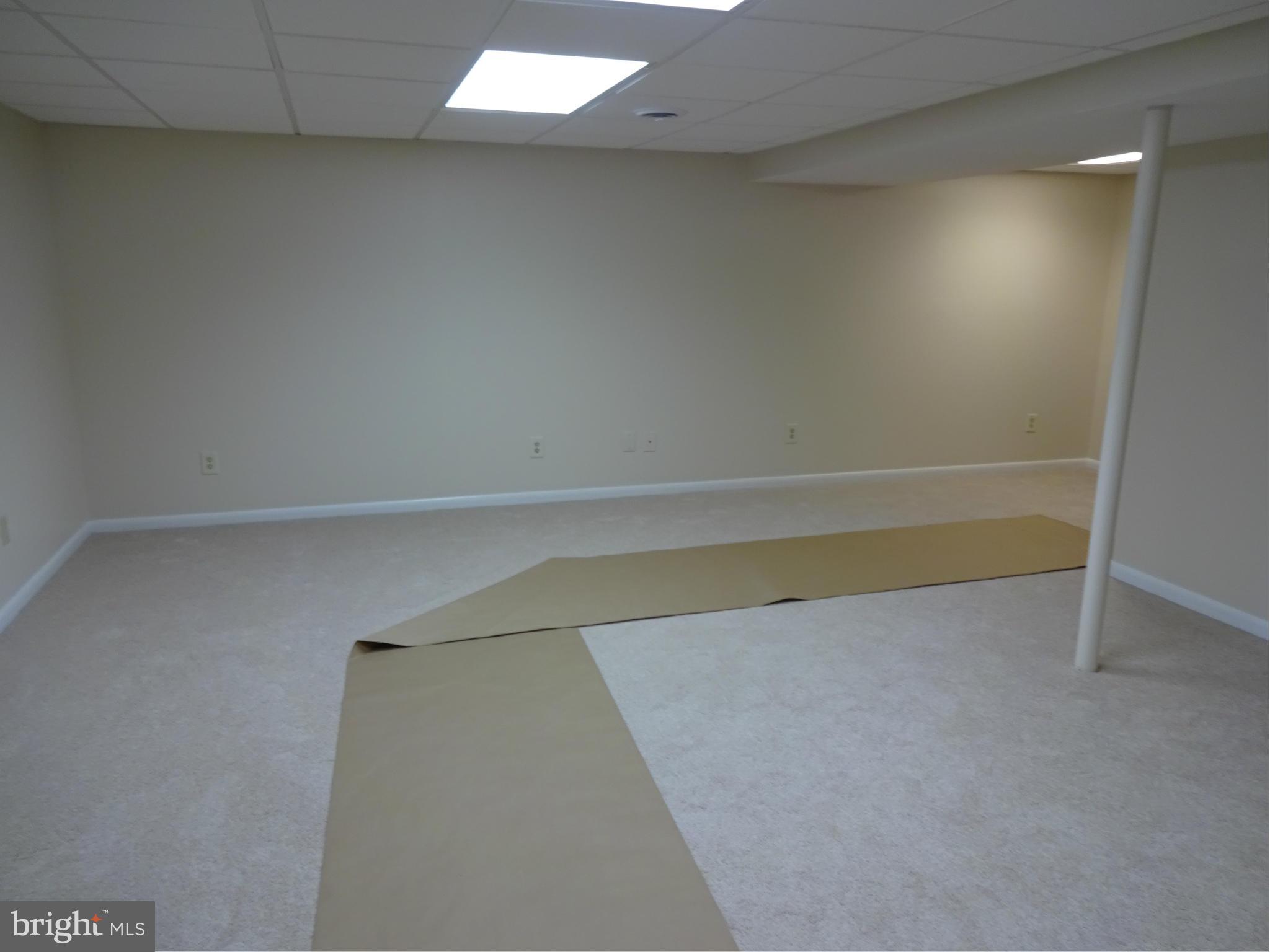 1613 Cape May Road Baltimore, MD 21221 - Photo 22 of 28 Spacious Family Room in the Lower Level