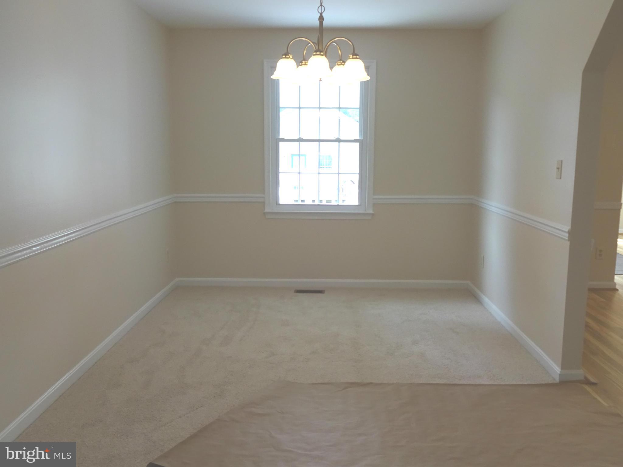 1613 Cape May Road Baltimore, MD 21221 - Photo 5 of 28 Dining Room Offering New Carpeting