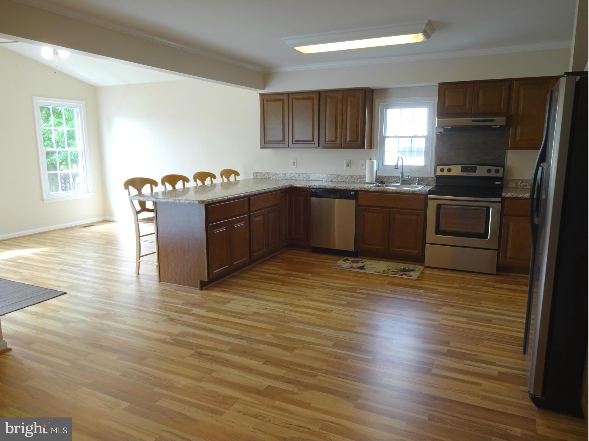 1613 Cape May Road Baltimore, MD 21221 - Photo 6 of 28 Spacious Kitchen w/ New Cabinets & Flooring