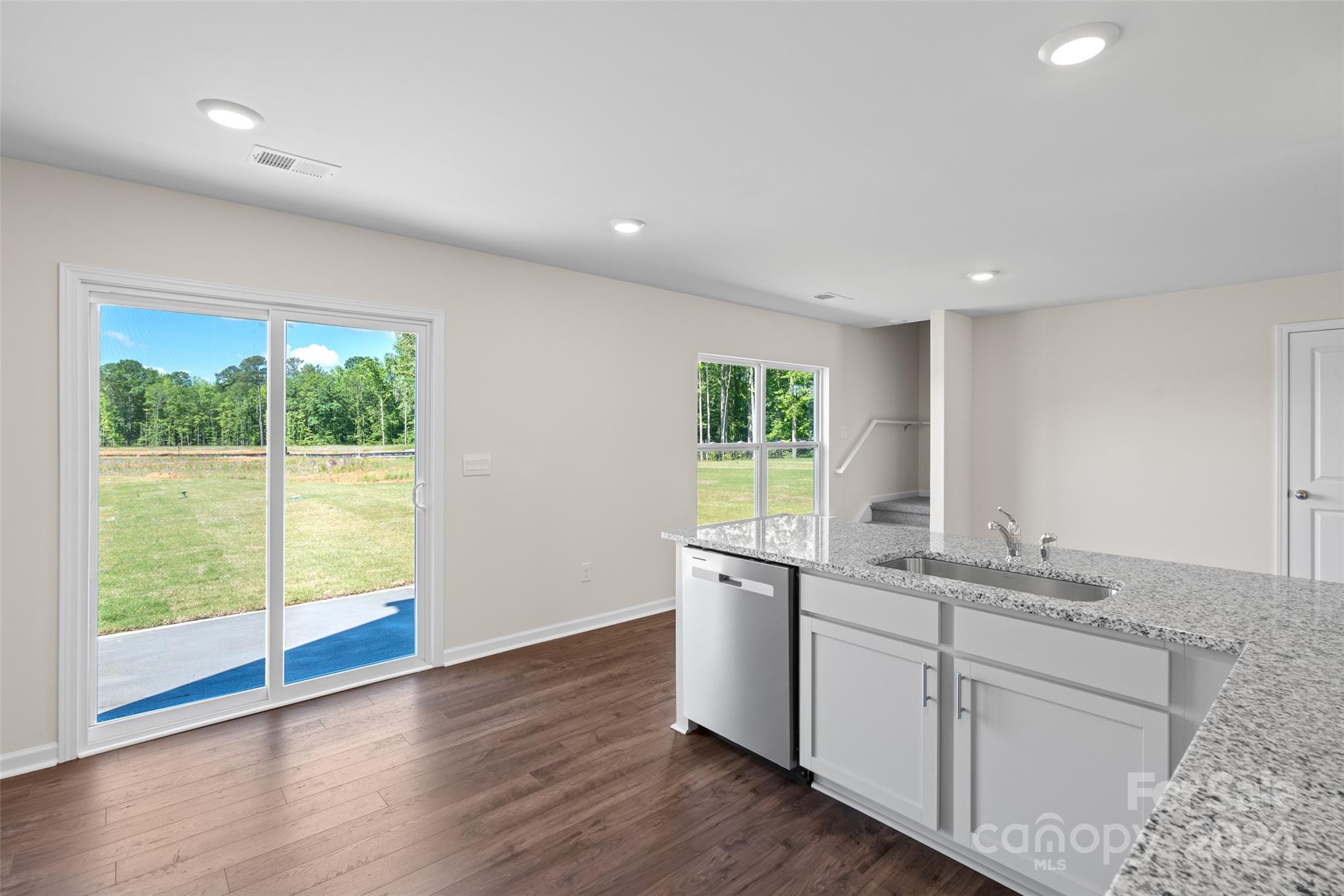 100 Callie River Clyde, NC 28721 - Photo 12 of 22 a kitchen with a sink and window