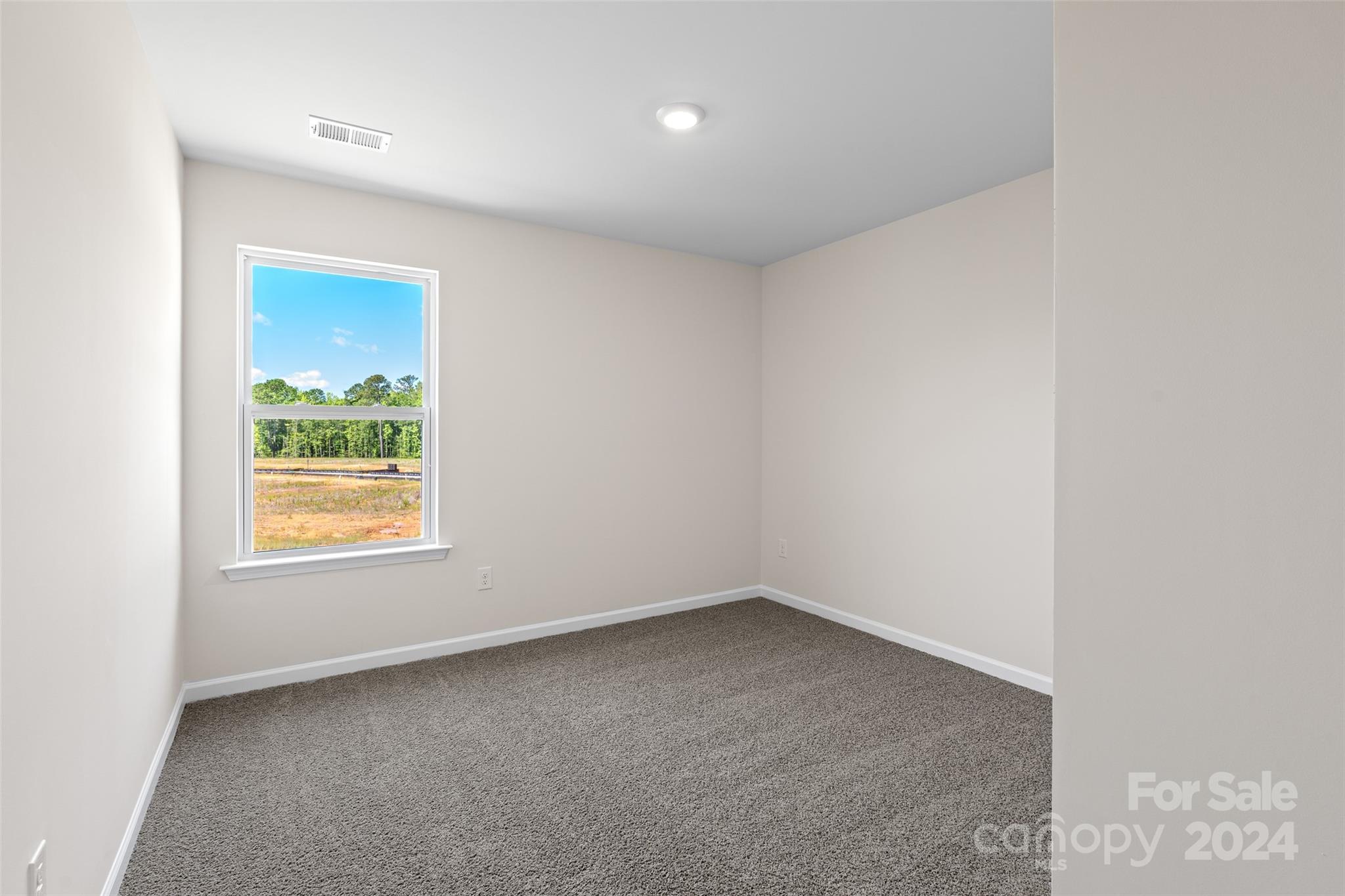 100 Callie River Clyde, NC 28721 - Photo 17 of 22 an empty room with a window