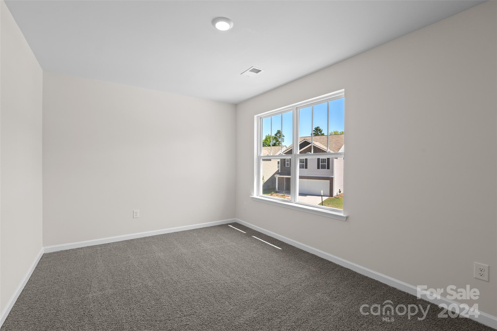 100 Callie River Clyde, NC 28721 - Photo 18 of 22 a view of an empty room with a window