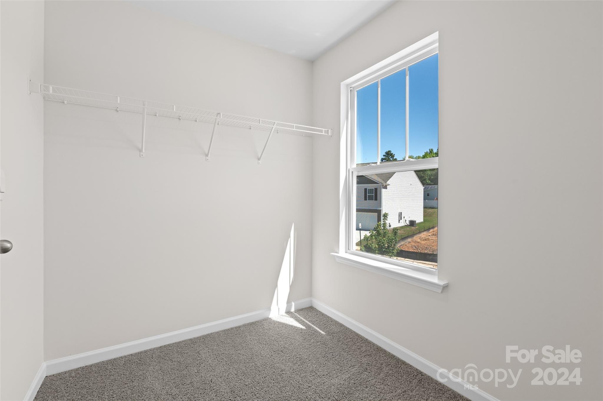 100 Callie River Clyde, NC 28721 - Photo 19 of 22 a view of an empty room with a window