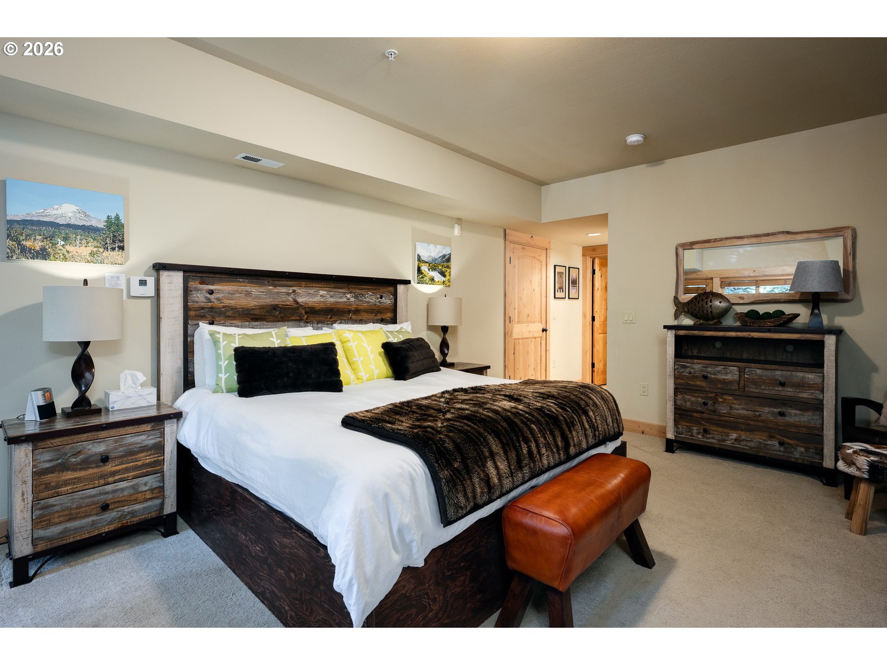 31250 East Collins Lake Road, Unit 6 Government Camp, OR 97028 - Photo 17 of 35 a bedroom with a bed and a television