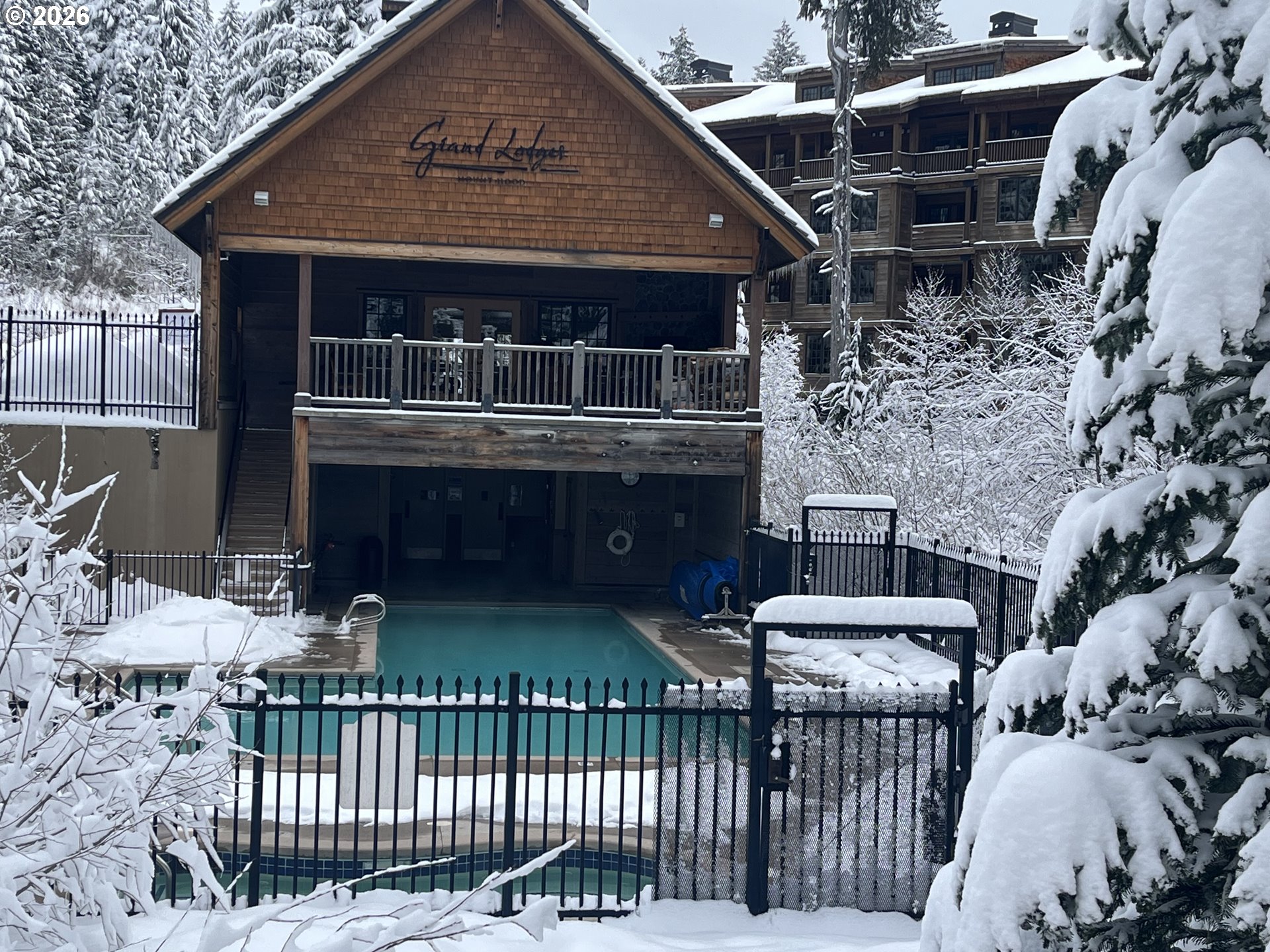 31250 East Collins Lake Road, Unit 6 Government Camp, OR 97028 - Photo 32 of 35 a front view of house with parking space