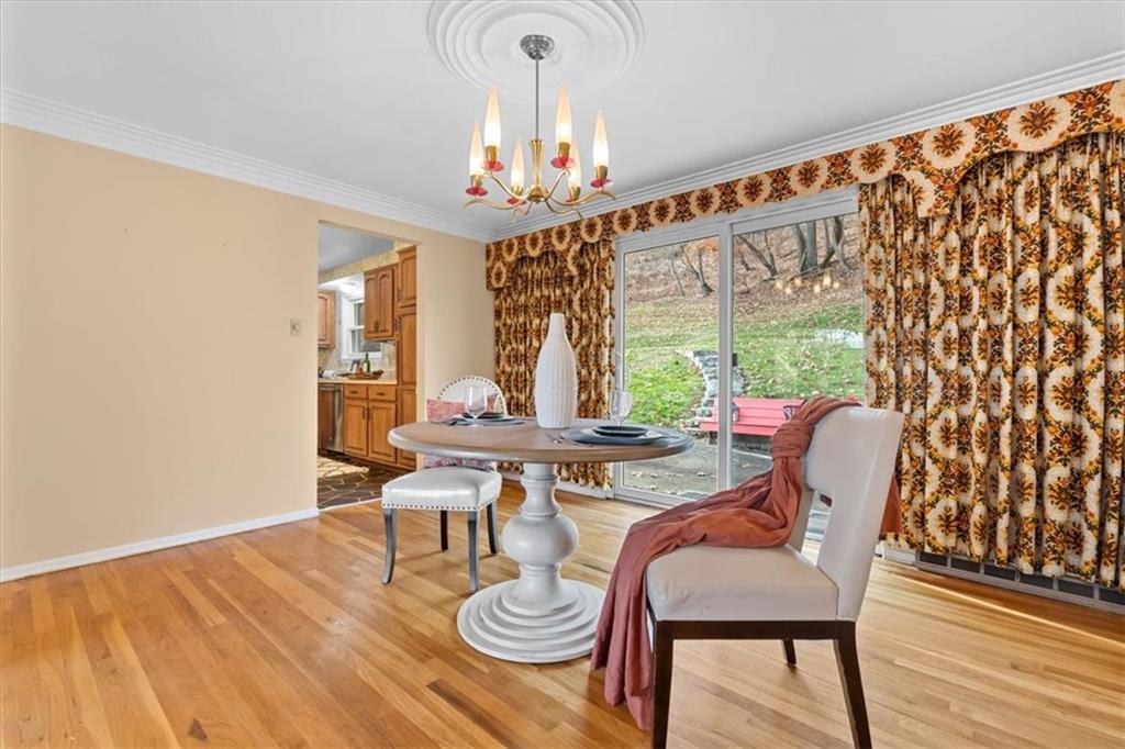 104 Dounreay Place Pittsburgh, PA 15237 - Photo 12 of 43 a view of a dining room with furniture window and wooden floor