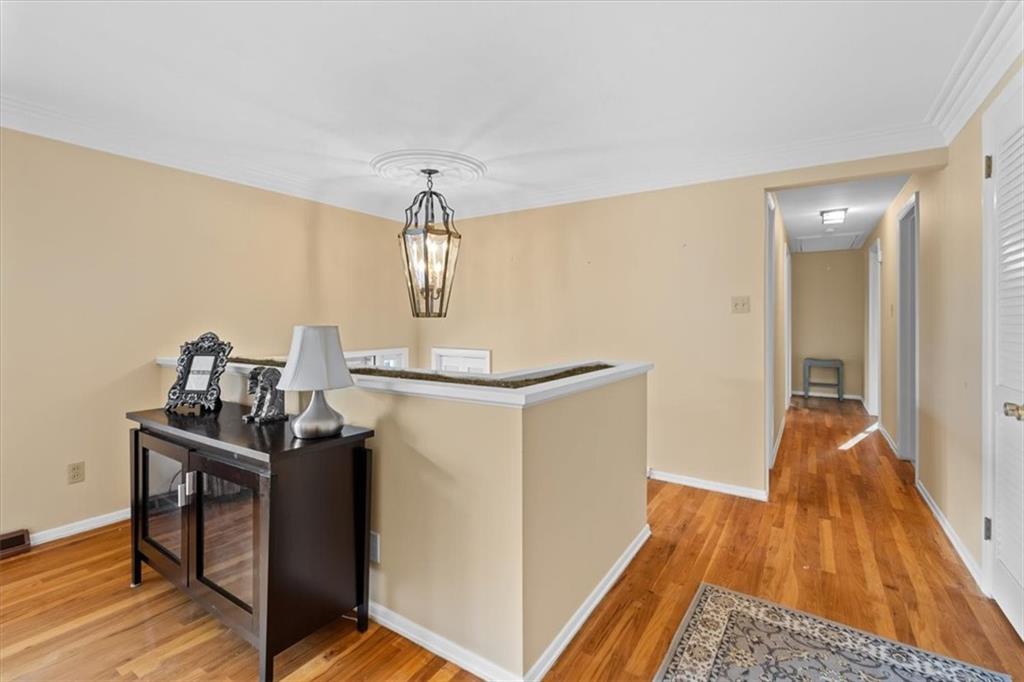 104 Dounreay Place Pittsburgh, PA 15237 - Photo 17 of 43 a view of a room with wooden floor