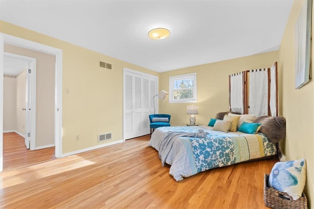 104 Dounreay Place Pittsburgh, PA 15237 - Photo 18 of 43 a bedroom with a bed and a window