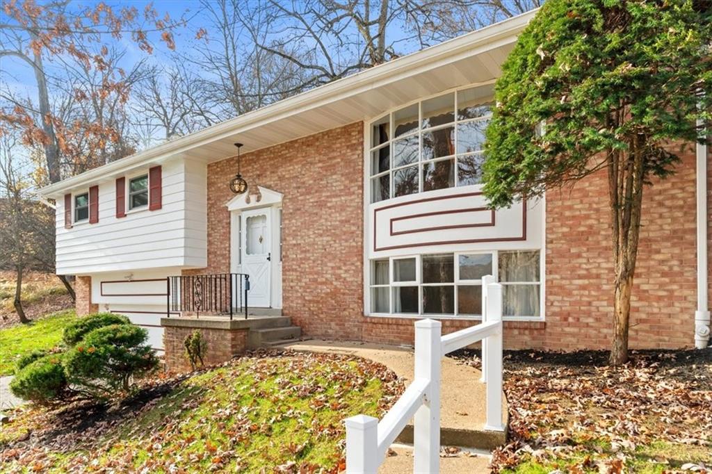 104 Dounreay Place Pittsburgh, PA 15237 - Photo 2 of 43 a front view of a house with large windows